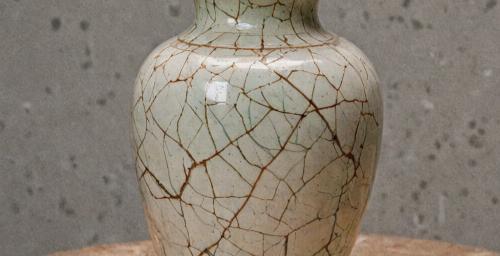 Restored porcelain vase showing invisible crack repair