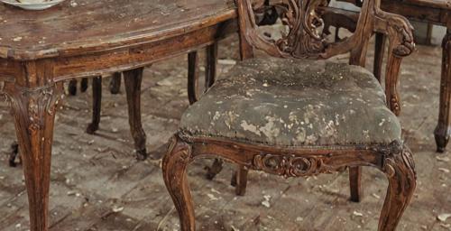 Victorian dining set before restoration showing damage